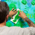 Artist, Gregos, creating live art on the night