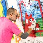 Artist, Pimax, creating live art on the night