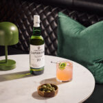 Laphroaig_Paloma_portrait_lifestyle_10yo-dark-market_1_glass_4975792